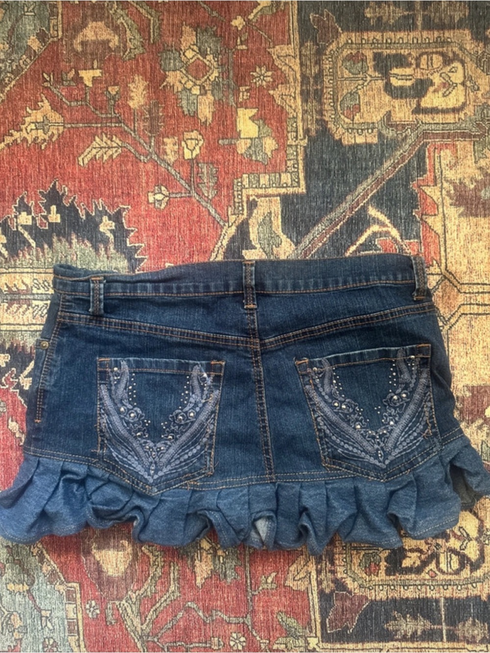 Y2K Denim Ruffle Mini Skirt with Embroidered Pockets - Blue